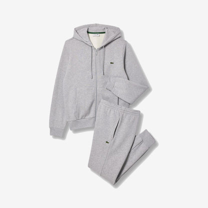 Ensemble Lacoste gris clair chiné, haut zippé à capuche et pantalon assorti
