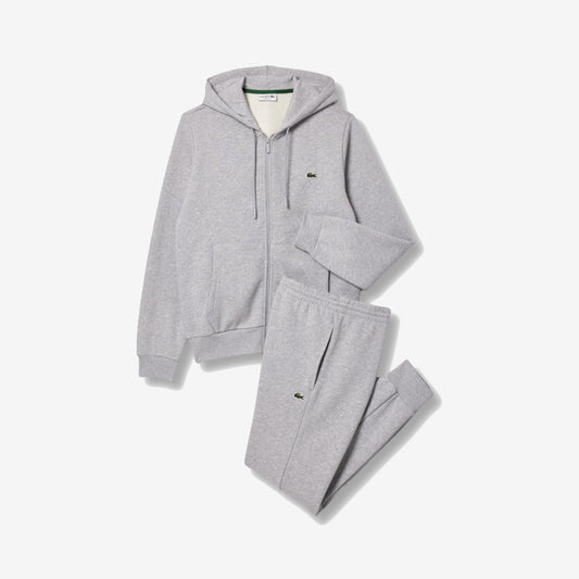 Ensemble Lacoste gris clair chiné, haut zippé à capuche et pantalon assorti