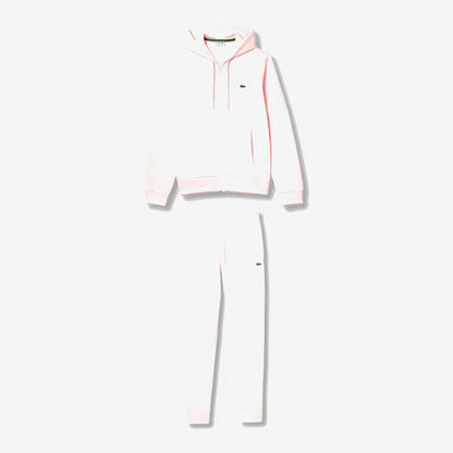 Ensemble Lacoste rose pâle, haut à capuche et pantalon assorti avec détails verts