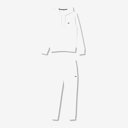 Ensemble Lacoste blanc, haut à capuche et pantalon assorti avec détails crocodile verts