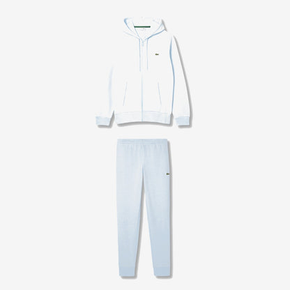 Ensemble Lacoste bleu clair, haut zippé à capuche et pantalon assorti