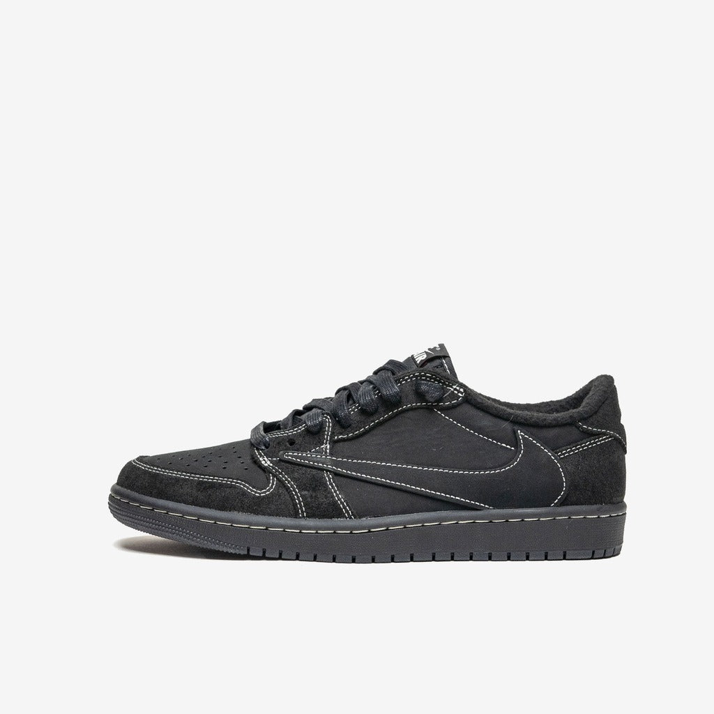 Jordan 1 Low Travis Scott Black Phantom noire à surpiqûres claires, vue de profil