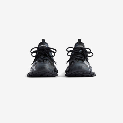 SNEAKER TRACK SIGNATURE EN NOIR/BLANC