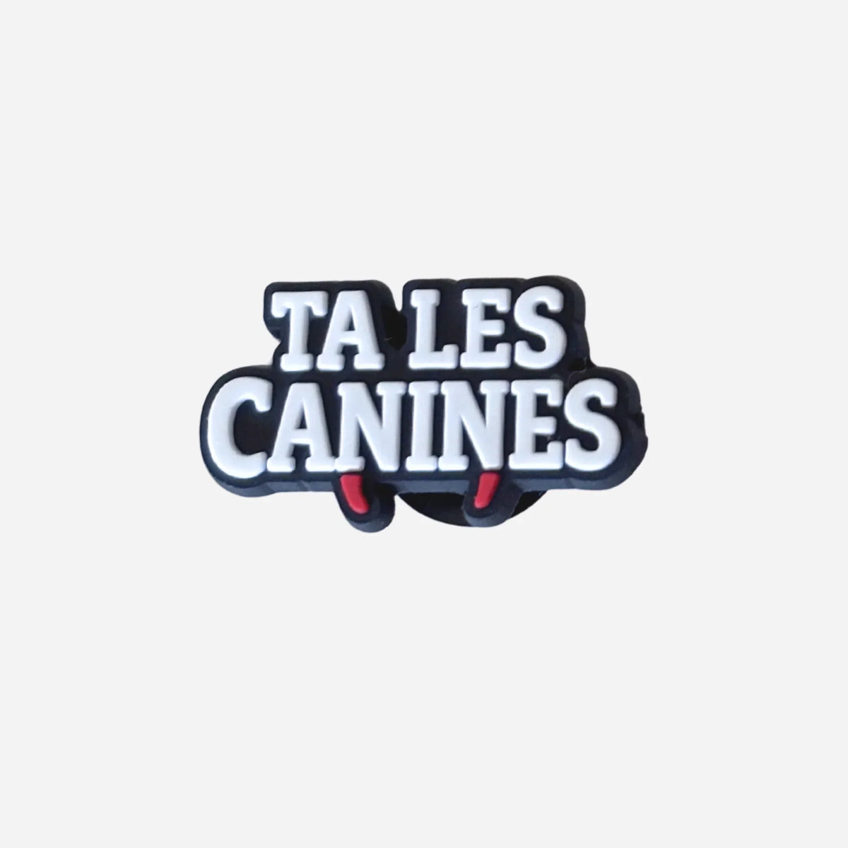 Pin's punchline Ta les canines lettrage blanc et crocs rouges pour Crocs 
